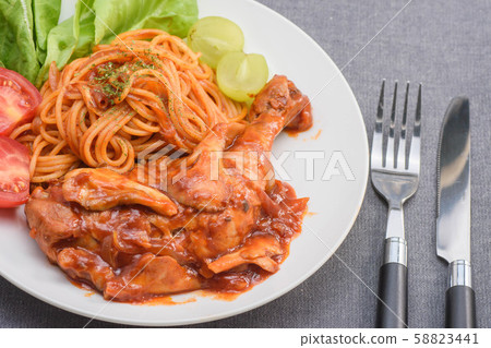 Chicken leg stewed in tomato sauce Chicken leg stewed in tomato sauce 58823441