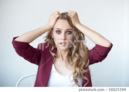 Close-up portrait of pretty attractive cheerful surprised wavy girl showing surprise gesture Close-up portrait of pretty attractive cheerful surprised wavy girl showing surprise gesture 58825399