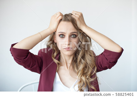 Close-up portrait of pretty attractive cheerful surprised wavy girl showing surprise gesture Close-up portrait of pretty attractive cheerful surprised wavy girl showing surprise gesture 58825401