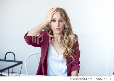 Close-up portrait of pretty attractive cheerful surprised wavy girl showing surprise gesture Close-up portrait of pretty attractive cheerful surprised wavy girl showing surprise gesture 58825405