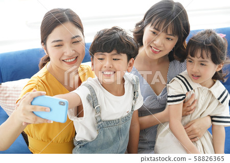 Parent and child mom friend selfie 58826365