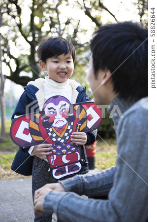 Father and son playing at New Year holidays 58826644
