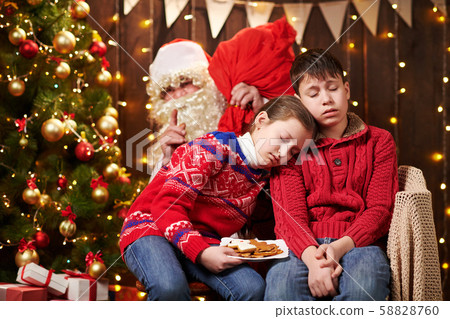 The children waited a long time for Santa, now The children waited a long time for Santa, now 58828760