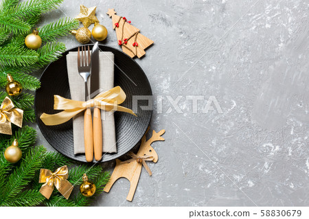 Top view of New Year dinner on festive cement 58830679