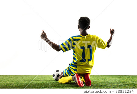 Professional african football or soccer player isolated on white background Professional african football or soccer player isolated on white background 58831284
