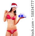 Santa woman in red lingerie with gift box 58834777