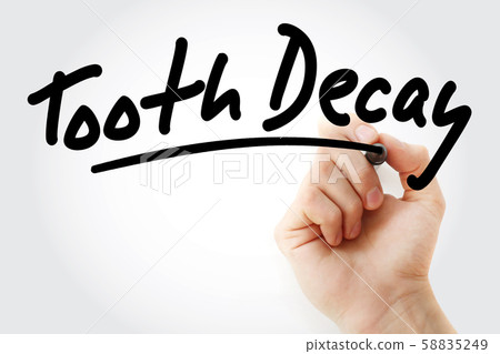 Hand writing Tooth decay with marker Hand writing Tooth decay with marker 58835249