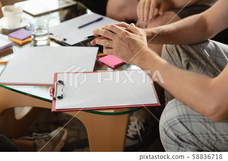 Group of young caucasian office workers have creative meeting to discuss new ideas 58836718