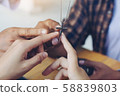 people christian team holding hands and touch 58839803