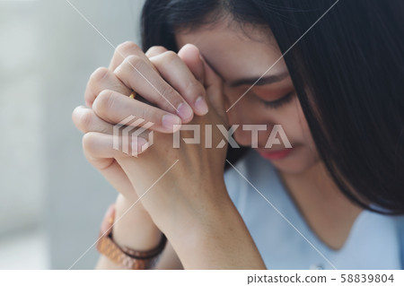 Women praying hand faith jesus promise Pray for 58839804