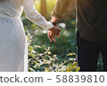 Sweetheart holding hand back lady man love bonding 58839810