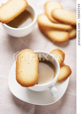 Italian traditional cookies Cat tongues Italian traditional cookies Cat tongues 58840544