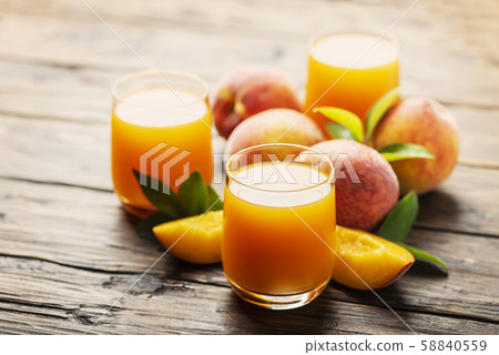 Fresh natural peach juice 58840559