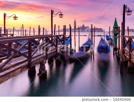 Large Venetian lagoon and promenade at dawn. Large Venetian lagoon and promenade at dawn. 58840900