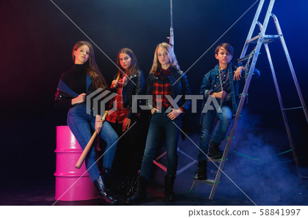 Full length portrait of cute little kids in stylish jeans clothes looking at camera and smiling Full length portrait of cute little kids in stylish jeans clothes looking at camera and smiling 58841997