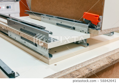Assembly of hard furniture, close-up drawers for drawers 58842641