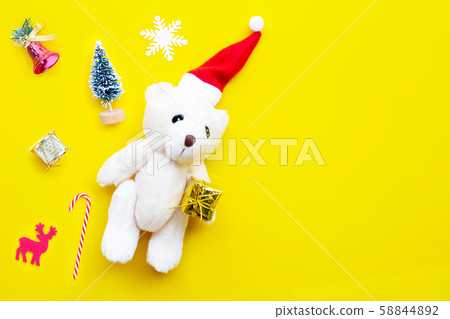 Toy bear wearing a santa hat Toy bear wearing a santa hat 58844892