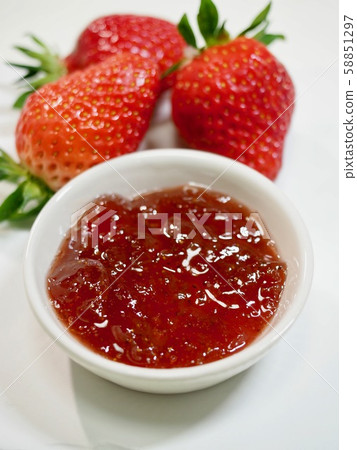Strawberries and strawberry jam 58851297