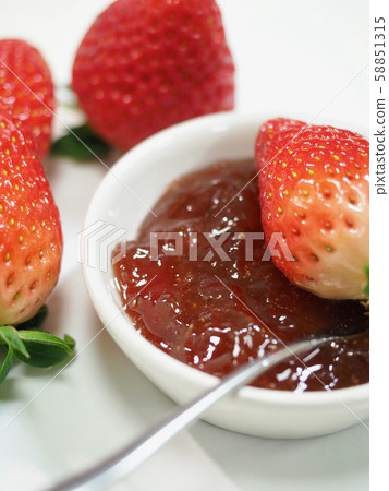 Strawberries and strawberry jam 58851315