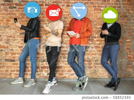 Creative millenial people connecting and sharing social media. Modern UI icons as heads 58852393