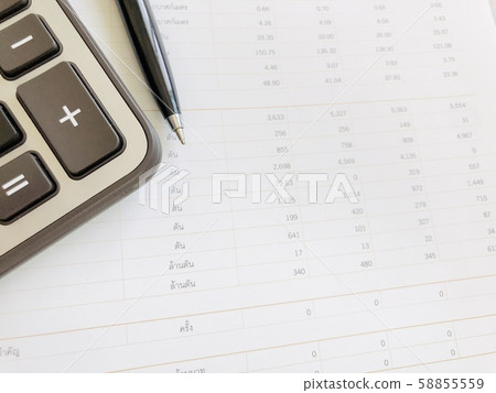 Business,finance, taxes, accounting, investment or money planning concepts : Calculator and pen on financial statements Business,finance, taxes, accounting, investment or money planning concepts : Calculator and pen on financial statements 58855559