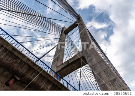 Modern suspension bridge. Detail of tower and steel cables 58855691