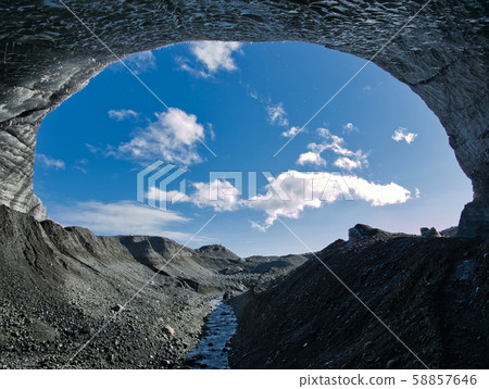 Entrance from the glacier to the blue glacier cave 58857646