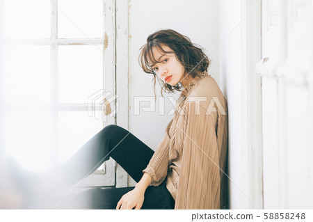 Fashion & hairstyle image of young woman Fashion & hairstyle image of young woman 58858248