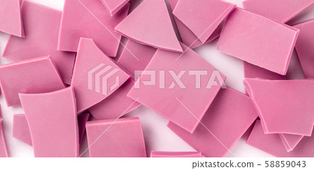 A panorama of ruby chocolate slices, overhead shot on a white marble background A panorama of ruby chocolate slices, overhead shot on a white marble background 58859043