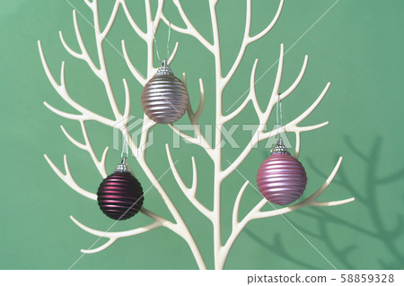 Christmas tree made of deer horns and bauble decoration on the deep green Christmas tree made of deer horns and bauble decoration on the deep green 58859328