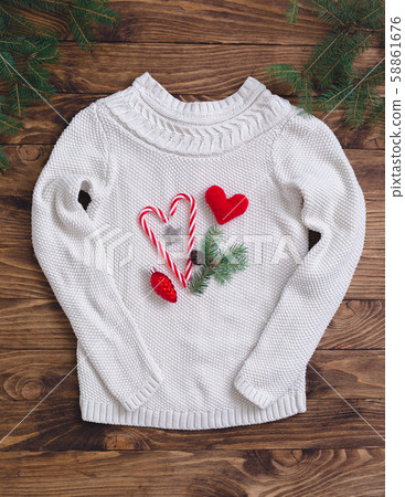 White woolen sweater background with christmas White woolen sweater background with christmas 58861676
