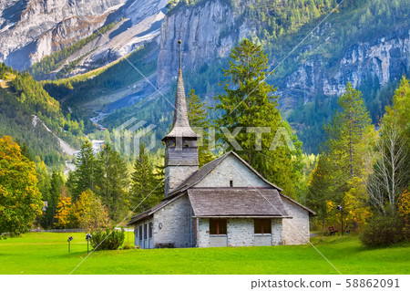 Kandersteg church, sunset mountains, Switzerland 58862091