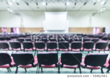 Blurred abstract background of business or educational conference and seminar in auditorium hall Blurred abstract background of business or educational conference and seminar in auditorium hall 58862461