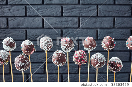 Festive chocolate tasty cake pops, top view 58863459