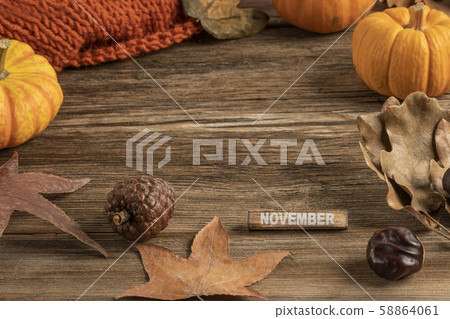 template for november with dried leaves on wooden 58864061