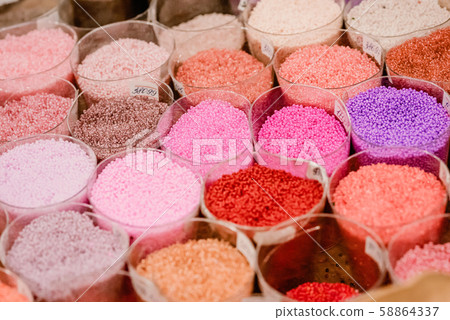 Colorful glass beads pattern. Beading. Variety of 58864337