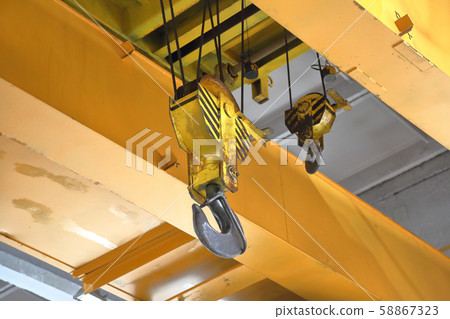 Large yellow metal hook for lifting Large yellow metal hook for lifting 58867323