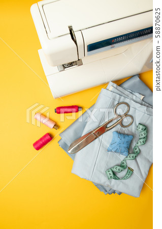 Top view of sewing machine with accessories for Top view of sewing machine with accessories for 58870625