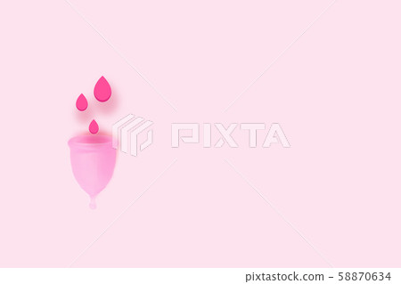 Pink menstrual cup with blood on pink background. Pink menstrual cup with blood on pink background. 58870634