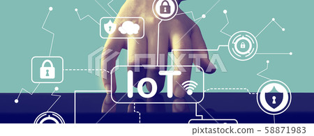 IoT security theme with hand pressing a screen 58871983