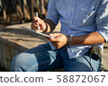 Male architect inspecting building house 58872067