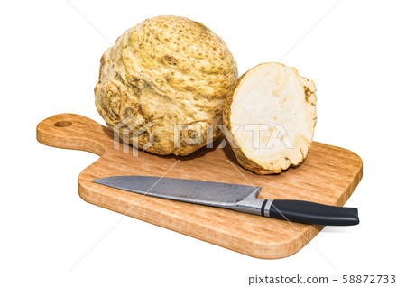 Knob celer lies on a wooden board next to a knife Knob celer lies on a wooden board next to a knife 58872733