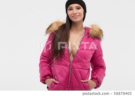 Attractive woman in snowboarding outwear 58878405