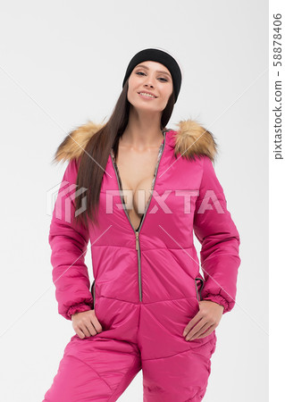 Attractive woman in snowboarding outwear 58878406