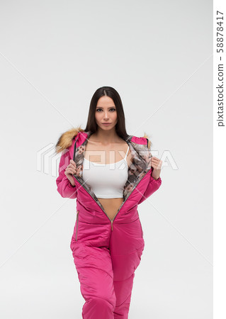 Attractive woman in snowboarding outwear 58878417