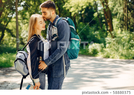 Cute couple have a rest in a summer forest 58880375