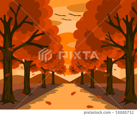 A small, beautiful road surrounded by nature. On both sides there are trees with orange leaves with leaves falling. In front there were mountains and orange sky at sunset. 58880732