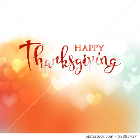 Hand drawn Happy Thanksgiving lettering on blurred background 58883417