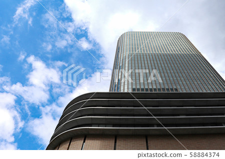 Looking up at the sky in the city Looking up at the sky in the city 58884374