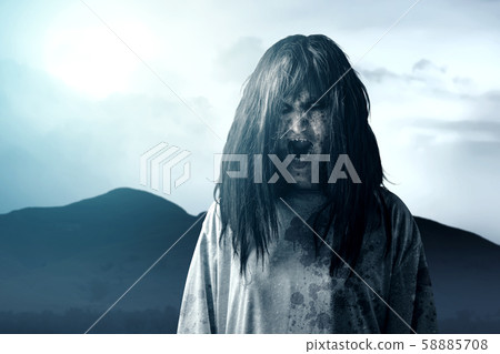 Scary ghost woman with blood and angry face Scary ghost woman with blood and angry face 58885708